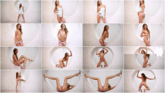 Posing nude in a circle on the wall | Download from Files Monster