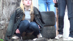 Girls pissing in the parking lot | Download from Files Monster