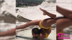 Schenja - Cute girl in bikini stretching during vacation | Download from Files Monster