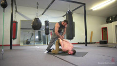 Slender stud humiliated and abused at the hands of his muscled tenant