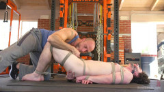 Bound gym whore gets the cum fucked right out of his uncut cock