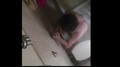 Solo Sucking a Purple Dildo