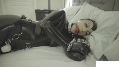 Chained and gagged on the vibrator gets an orgasm